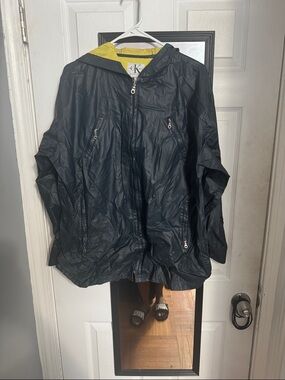 Calvin Klein Navy Raincoat with Yellow Hood Lining